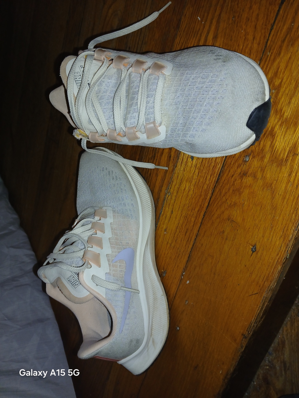Light  Nike Running Shoes with Pale Pink Accents